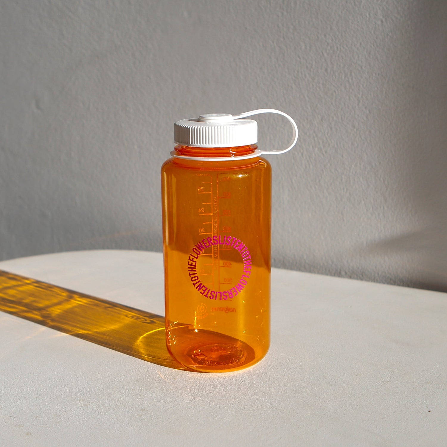orange reusable nalgene water bottle