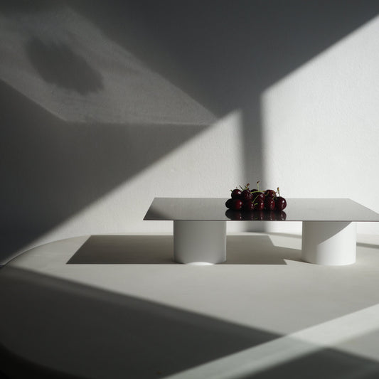 stainless steel serving board with cherries