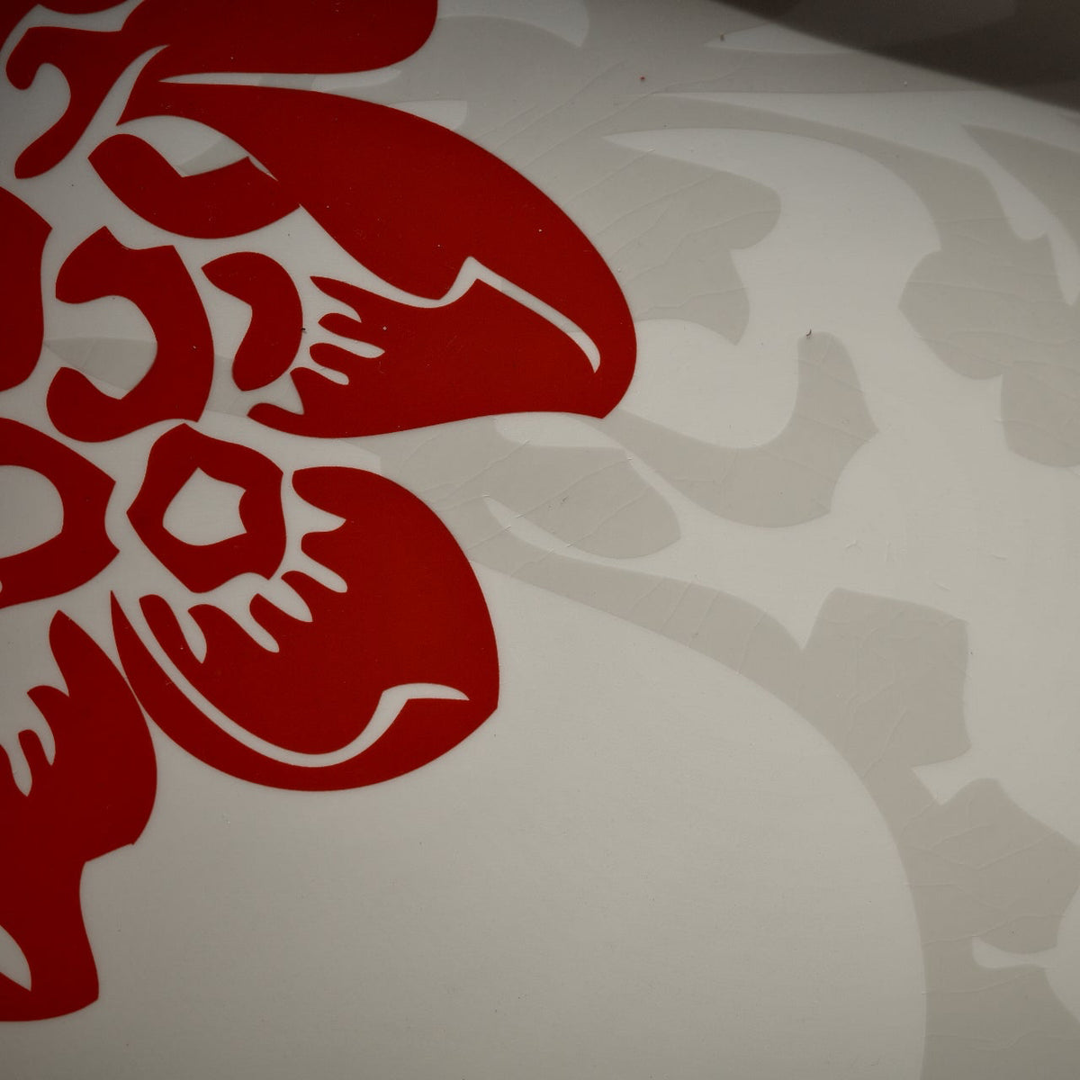 Close up of hibiscus flow on ceramic tray