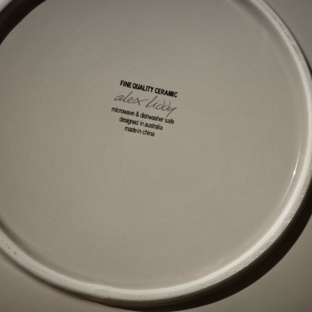 Bottom of ceramic plate designed by Alex liddy