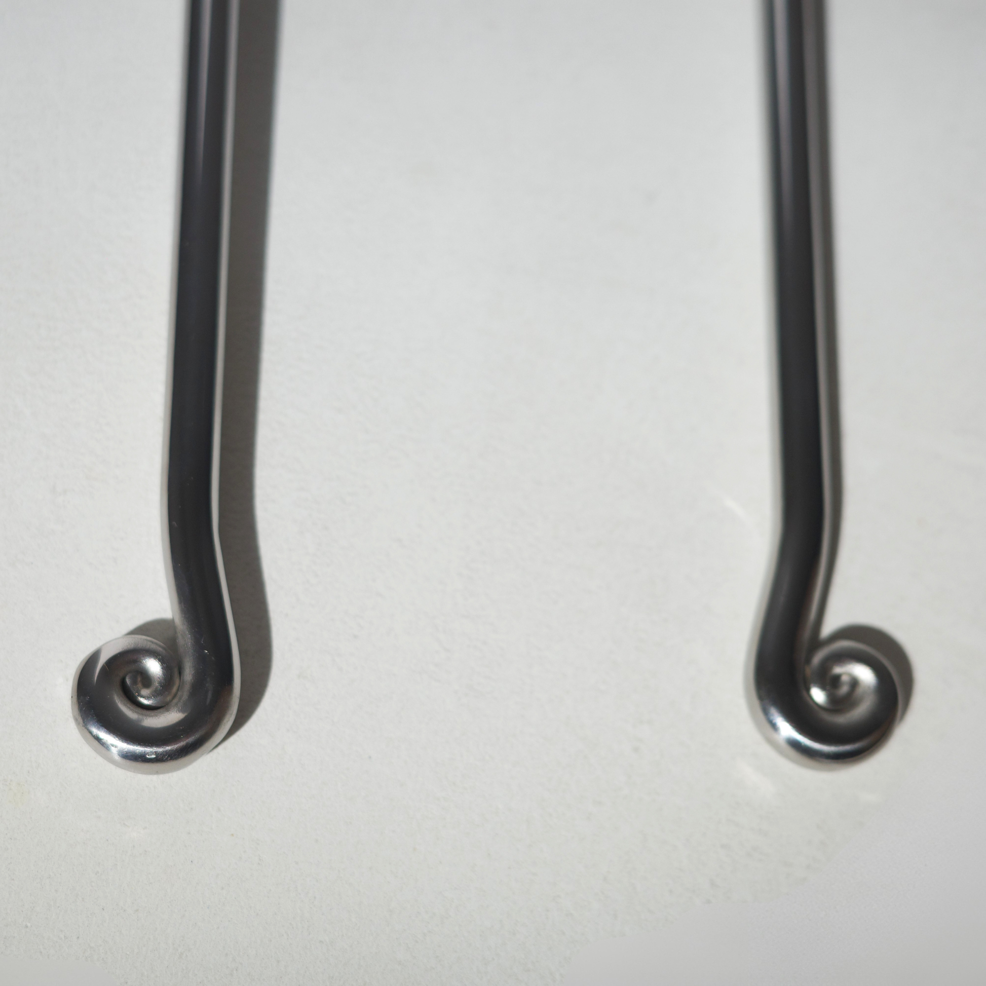 Stainless steel salad servers with a spiral twisted end