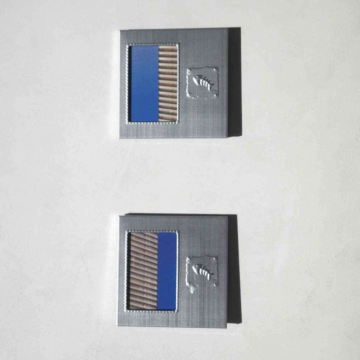 2 square brushed metal art picture frames with embossed fish